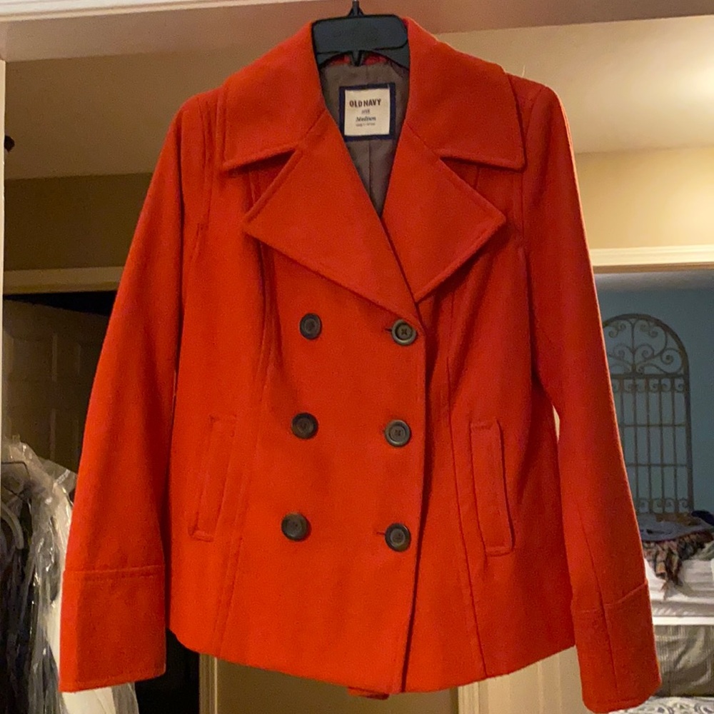 Size medium orangey/red pea coat. Great condition